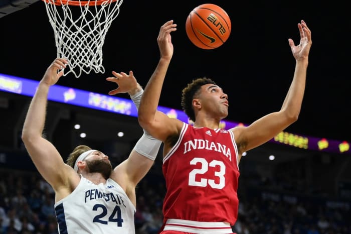 Penn State Nittany Lions forward Michael Henn (24) and Indiana Hoosiers forward Trayce Jackson-Davis (23) react to a loose ball during the first half at the Bryce Jordan Center.